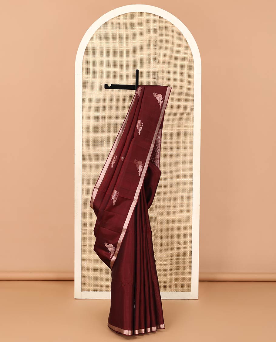 Maroon mayil motifs zari woven Mayuri soft silk saree, zari piping border, and ogee patterned pallu