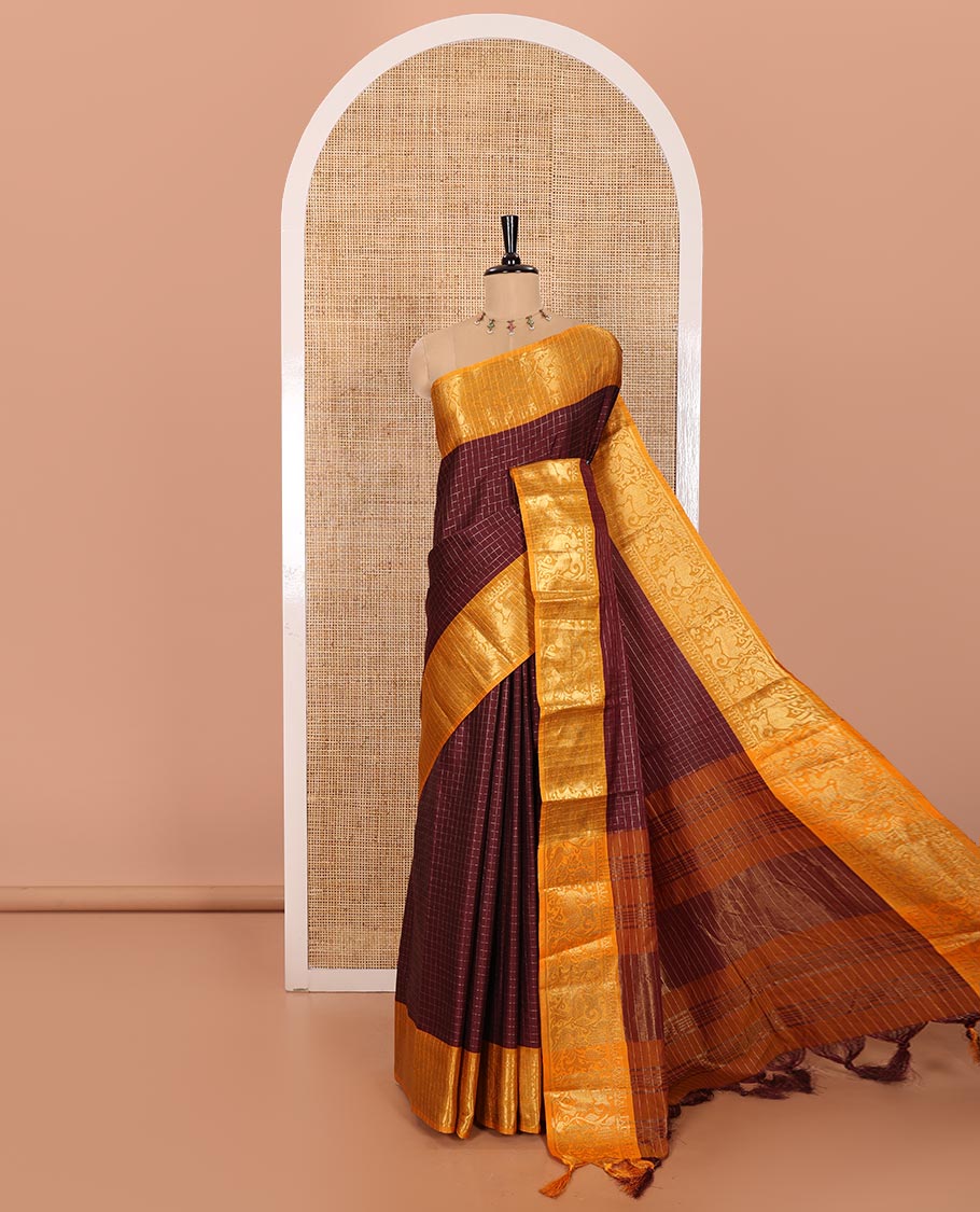 Maroon Semi-Taffeta Saree Mesmerized with Medium-Sized Zari Checks, Complemented with a Contrast Border Featuring Floral and Deer Motifs in Zari, Pallu of Stripes, and Paired with a Contrast Blouse