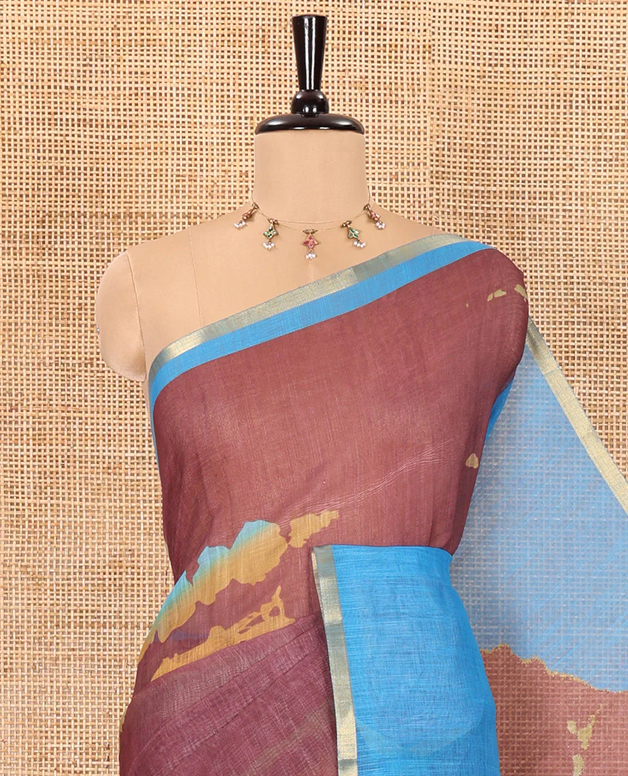 Maroon shibori printed linen cotton saree, contrast piping zari border, shibori circle printed pallu, and a contrast shibori printed blouse - Image 2