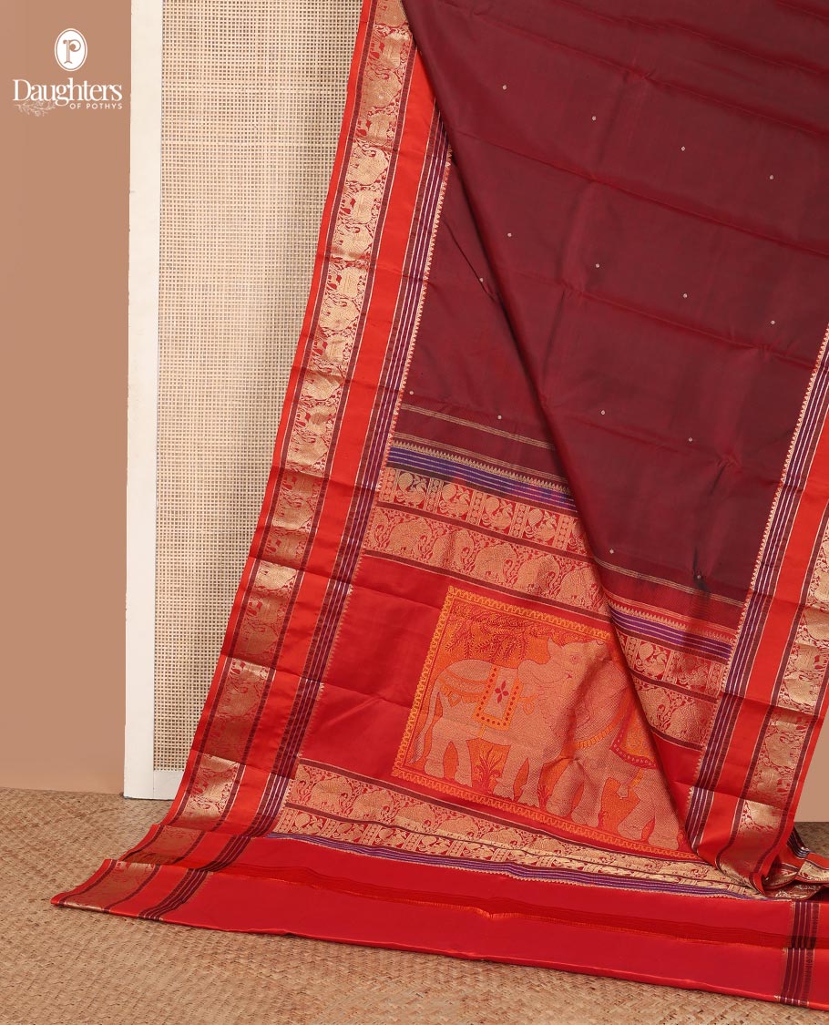 Maroon thread buttas Kanchipuram silk saree, contrast rettai pettu border of rekku, rudraksham, yaanai, and Pichwai cow designs, and pallu features Vrishabha Kunjara design - Image 3