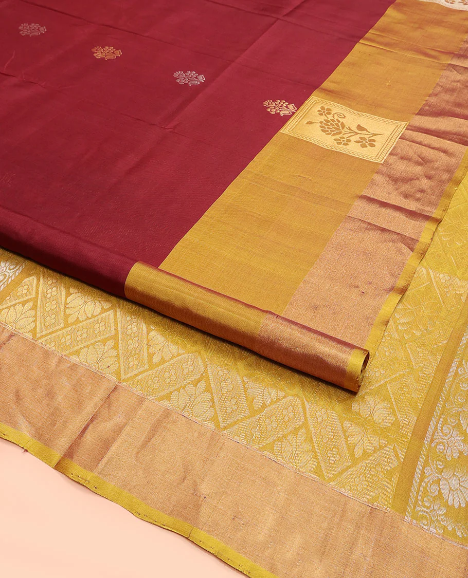 Maroon Uppada Silk Saree Detailed with Floral Zari Buttas, Complemented by a Contrast Border of Floral Butta Enclosed Square Design, Pallu Decked Up with Intricate Designs, and Paired with a Contrast Blouse - Image 2