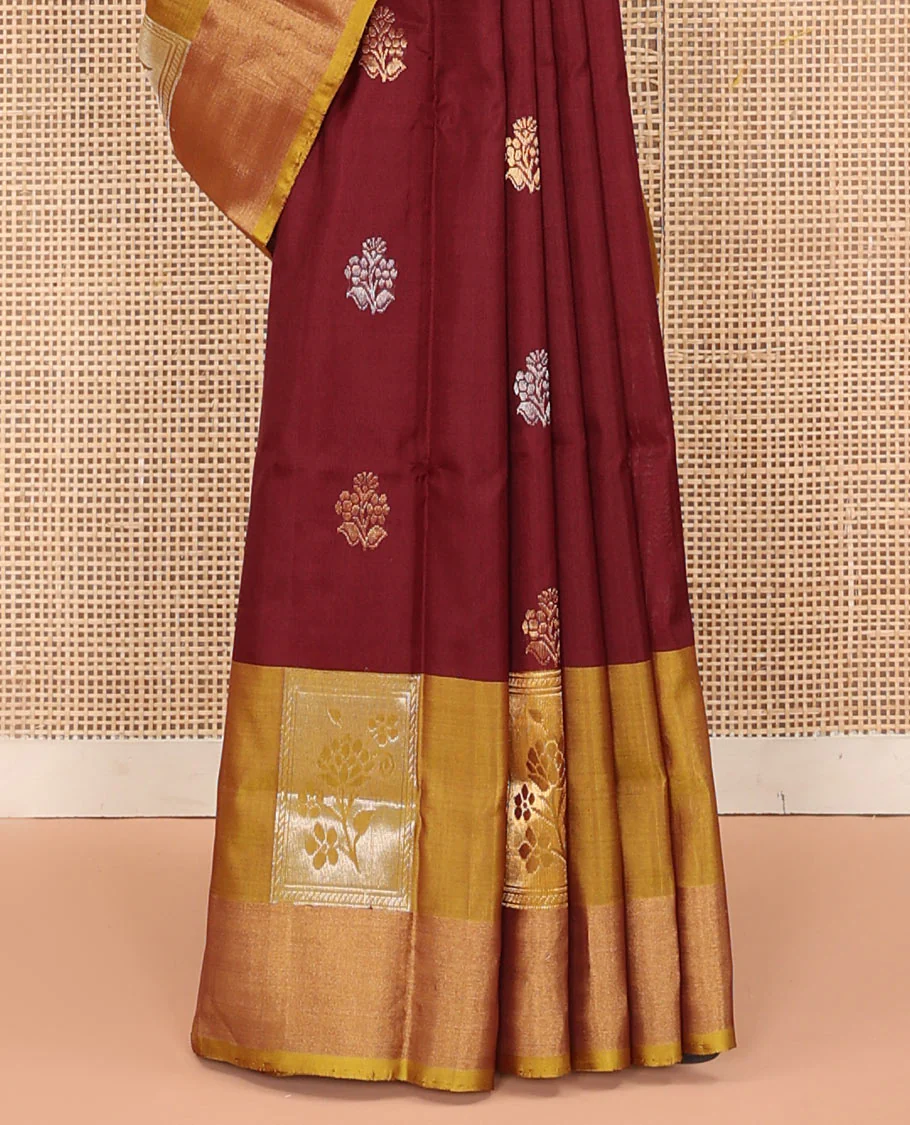 Maroon Uppada Silk Saree Detailed with Floral Zari Buttas, Complemented by a Contrast Border of Floral Butta Enclosed Square Design, Pallu Decked Up with Intricate Designs, and Paired with a Contrast Blouse - Image 4
