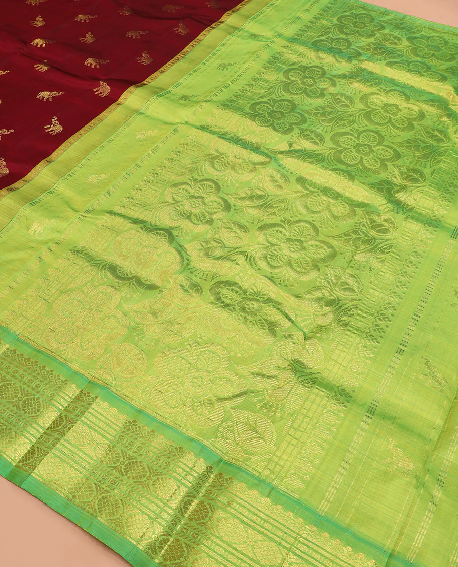 Maroon yaanai buttas Kanchipuram silk saree, contrast thazampoo rekku checked border of salngai, banaras, lavangam, and laddu kamalam designs, and floral design pallu - Image 5