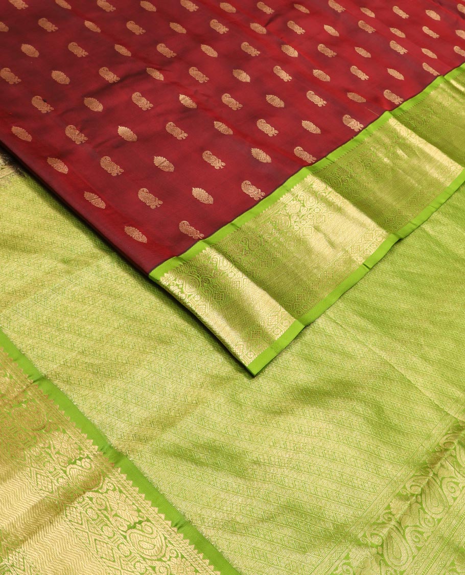 Maroon zari buttas Vasundhara silk saree, contrast border of rekku, muthu, banaras, manga, kamalam, diamond, and vanki designs, and diagonal striped pallu - Image 2