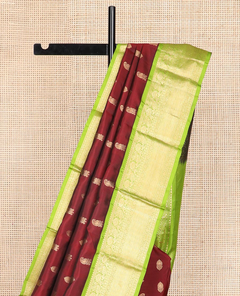 Maroon zari buttas Vasundhara silk saree, contrast border of rekku, muthu, banaras, manga, kamalam, diamond, and vanki designs, and diagonal striped pallu - Image 3