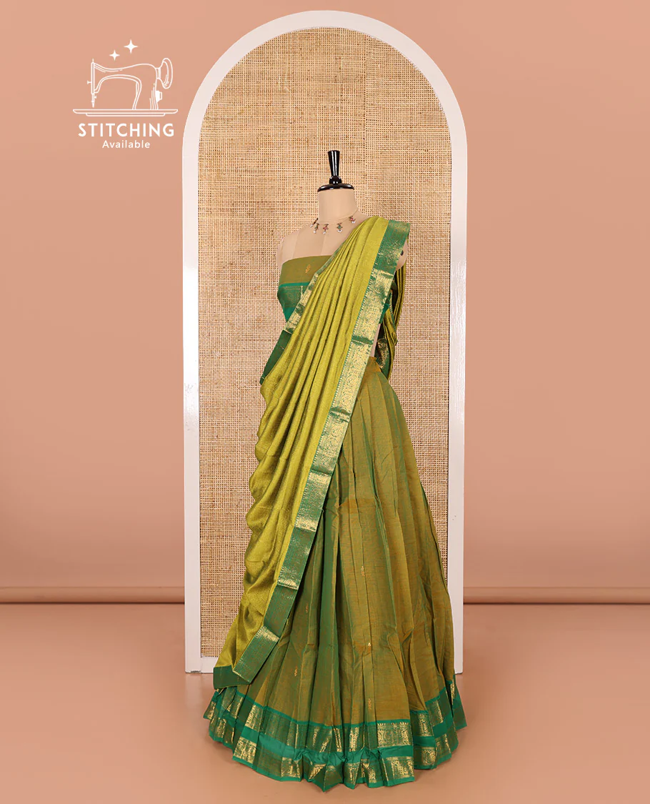 Mehendi Green and Green Chettinad Cotton Half-Saree Featuring Buttas Woven Skirt, Highlighted with a Contrast Rettai Pettu Peacock Motifs Woven Zari Border, a Subtly Woven Matching Blouse, and a Vichitra Silk Contrast Traditional Zari-Bordered Dhavani - Image 3