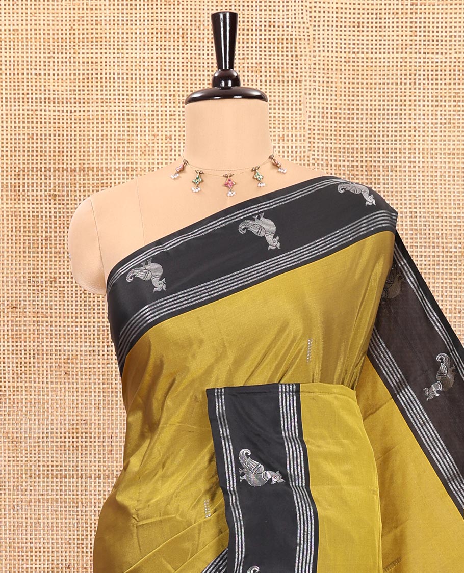 Mehendi Green Semi-Soft Silk Saree Featuring Zari Buttas Woven Across Its Body, Complemented by a Contrast Peacock Motifs Zari Border, Subtly Made Self-Pallu, and a Matching Blouse - Image 2