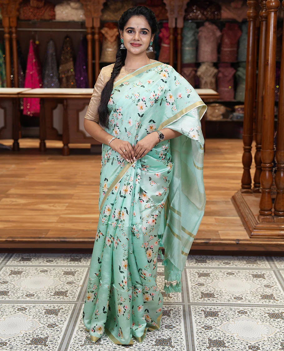 Mint green floral motifs digital printed banana pith saree, piping border, striped pallu, and floral printed blouse - Image 2