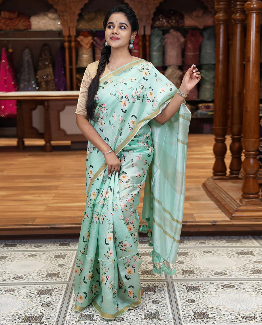 Mint green floral motifs digital printed banana pith saree, piping border, striped pallu, and floral printed blouse - Image 3