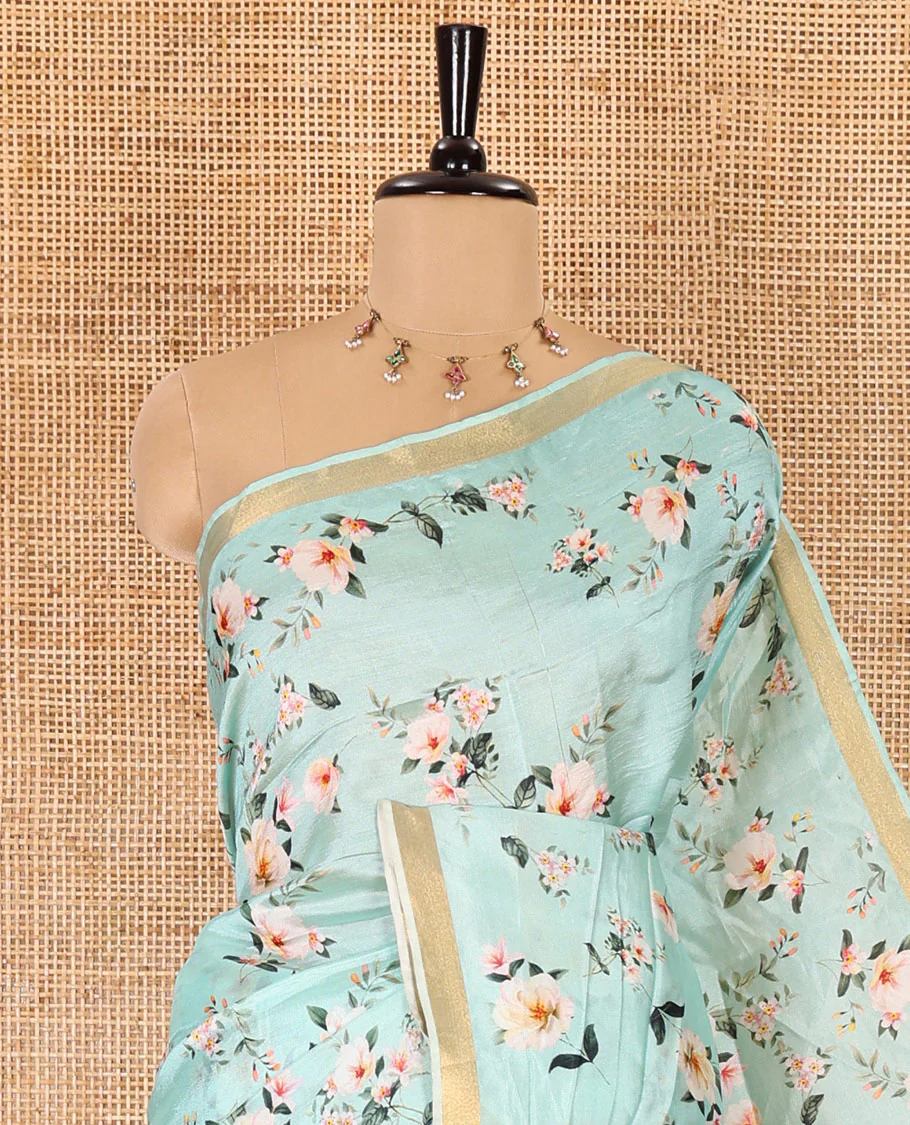 Mint green floral motifs digital printed banana pith saree, piping border, striped pallu, and floral printed blouse - Image 5