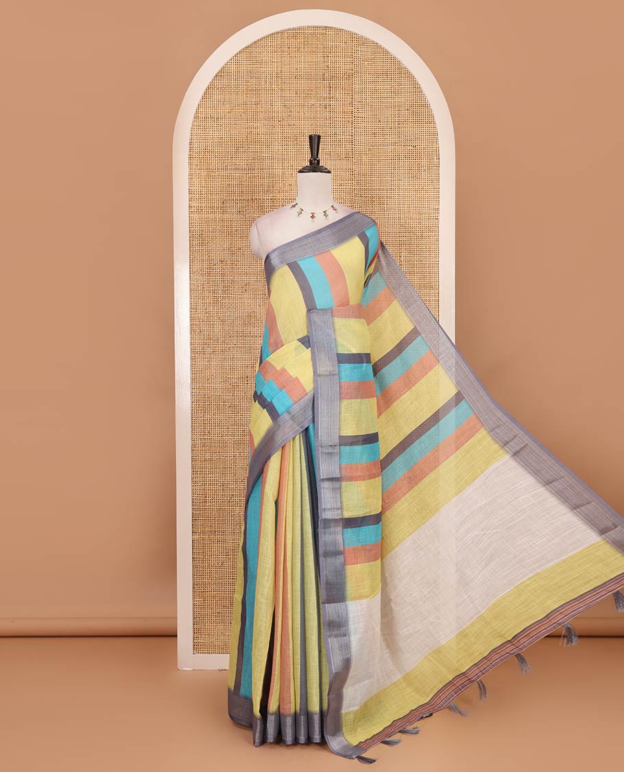 Multi-colored stripes-block linen saree, zari bavanji border, plain pallu & printed blouse