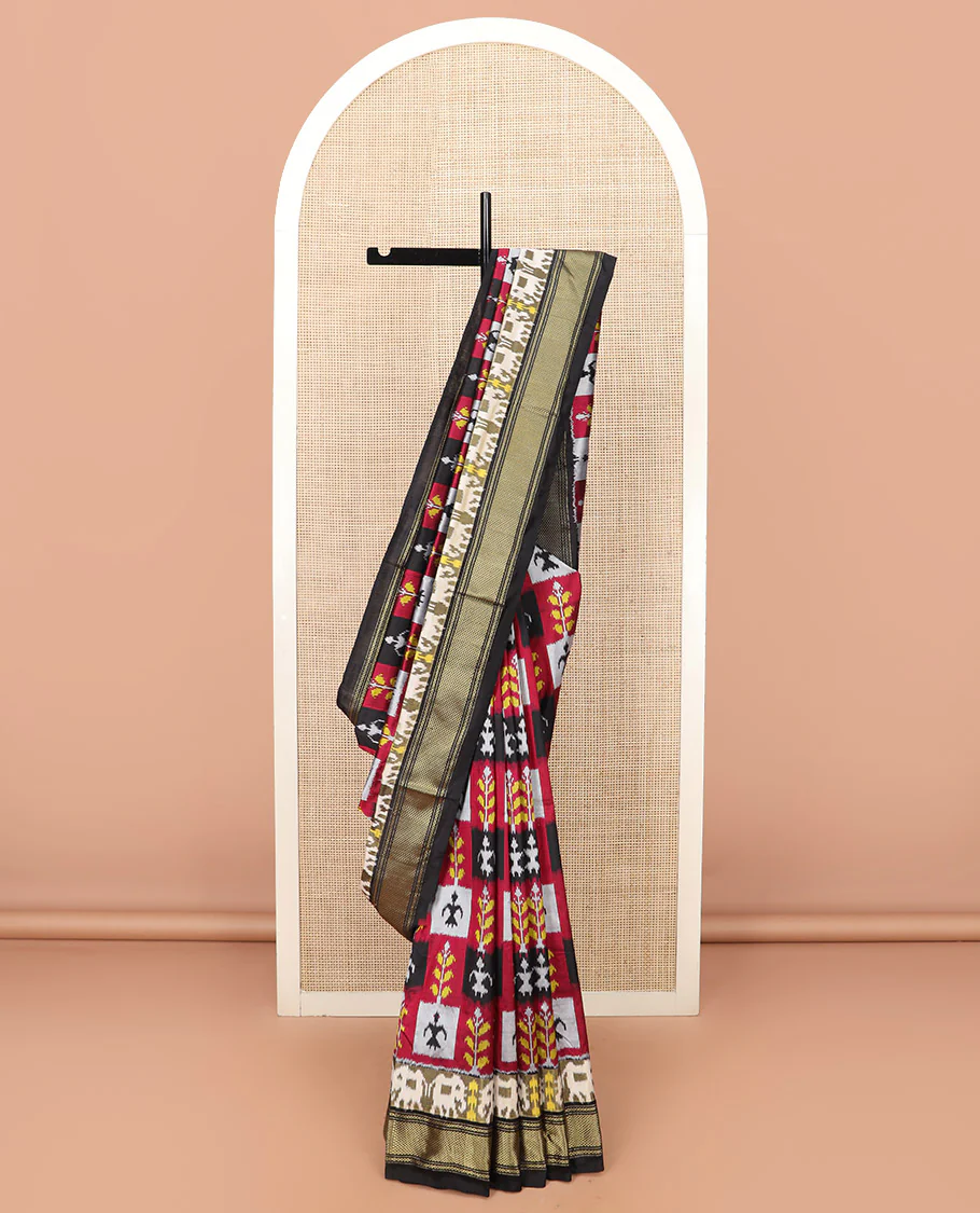 Multi-Colour Ikkat Silk Saree Features Warli Human Buttas and Flower Buttas, a Contrast Border Steeped with Traditional Zari Designs, a Pallu of Diamond Patterns, and a Contrast Blouse - Image 2
