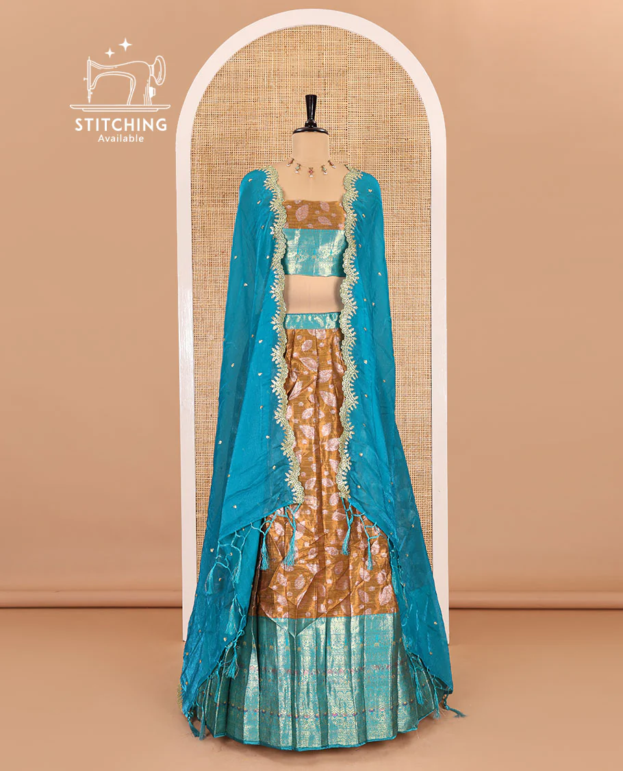 Mustard and rama color half-saree, leaf jacquard with contrast traditional bordered banarasi tissue skirt, a matching blouse, and a contrast scallop embroidered fendi organza dhavani - Image 2