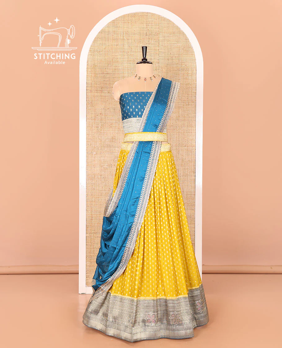 Mustard Buttas Embroidered Half-Saree with Contrast Traditional Motifs, Embroidered Viscose Georgette Border, Contrast Blouse, Intricately Embroidered Syska Georgette Dhavani, and a Embroidered Belt