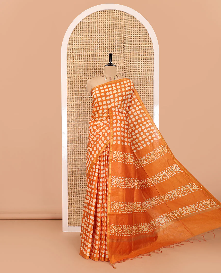 Mustard coin butta batik printed Bhagalpur cotton saree, zari piping border, batik printed pallu, and a plain blouse