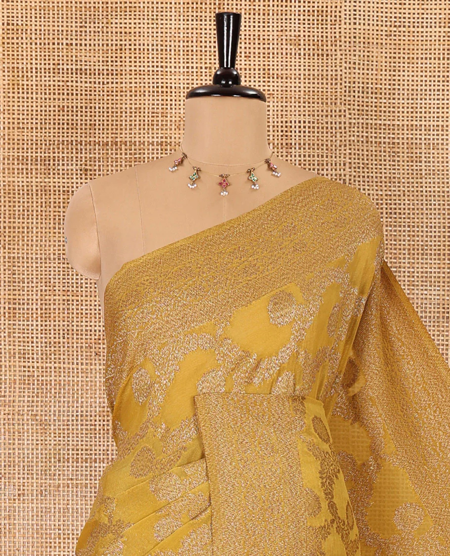 Mustard jaal jacquard fancy crepe banaras khaddi saree, floral creeper design border, ogee patterned pallu, and a matching blouse - Image 2