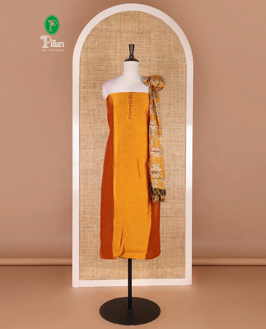 Mustard material chudidar set, plain with fancy thermacol balls neck work Vichitra top, cotton bottom, and floral printed dupatta