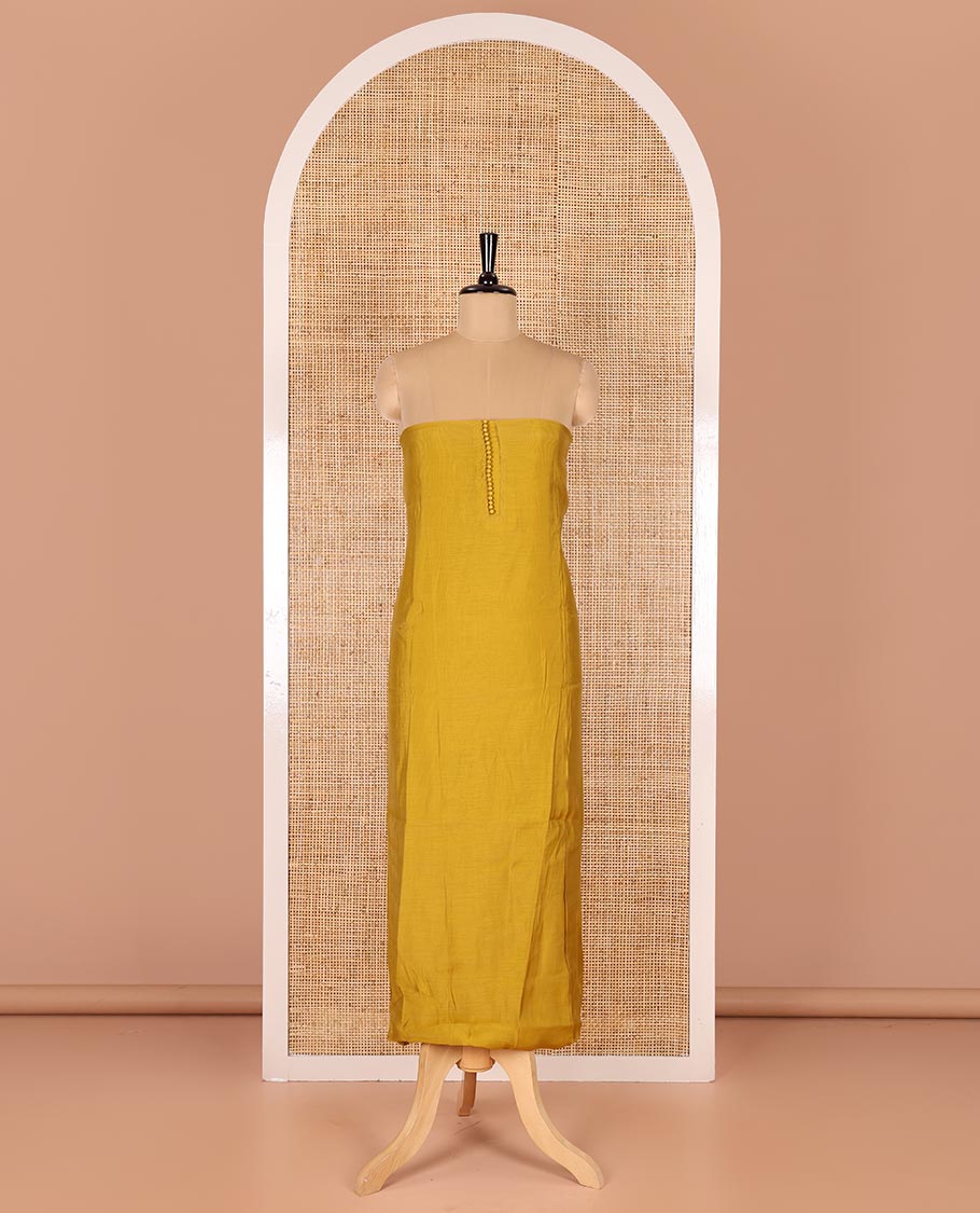 Mustard material chudidar set, plain with pom-pom tasseled mul chanderi top, a matching bottom, and organza dupatta of stripes - Image 3