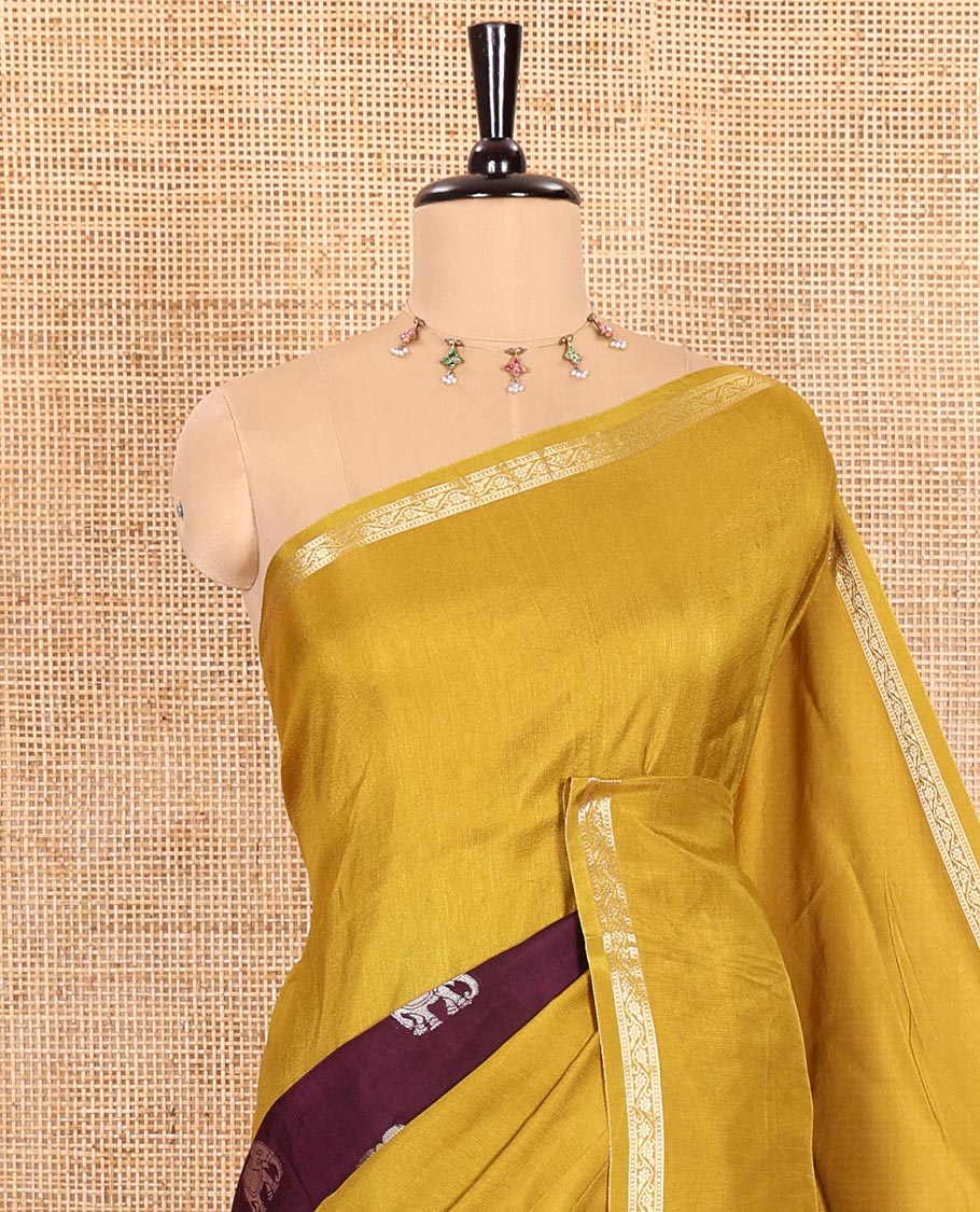 Mustard Russian Silk Saree Featuring Double-Sided Plain and Central Zari Elephant Motifs Weave, Accentuated by a Subtle Traditional Zari Border, Enhanced with a Zari-Designed Pallu, and Paired with a Blouse Depicting Meenakari Peacocks - Image 2