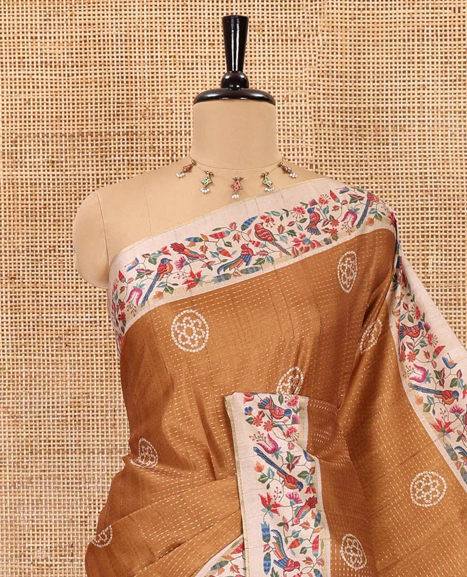 Mustard zari buttas and bandhani dotted fancy tussar saree, contrast floral and bird printed border, striped pallu, and a matching blouse - Image 2