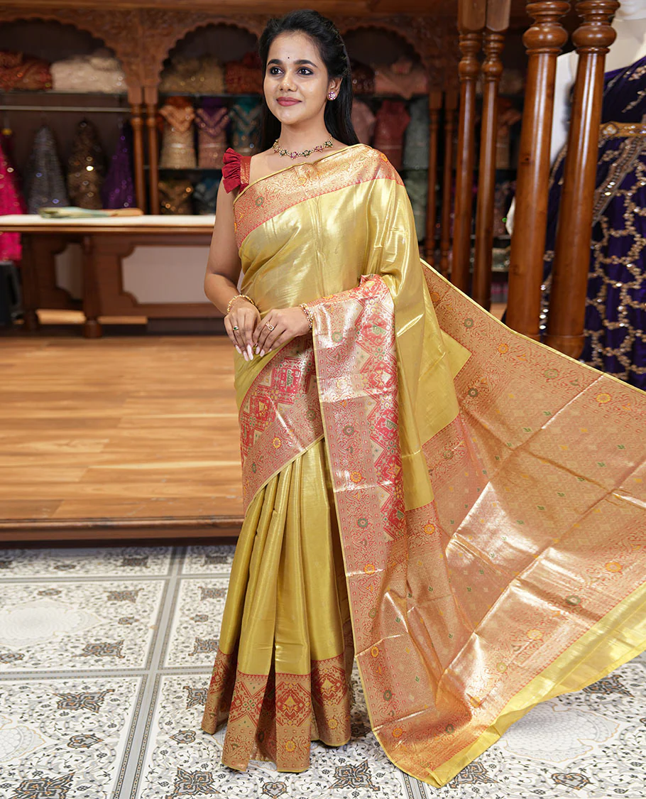 Mustard zari buttas tissue silk saree, contrast border of patola design and traditional motifs, jaal pallu, and a matching blouse - Image 3