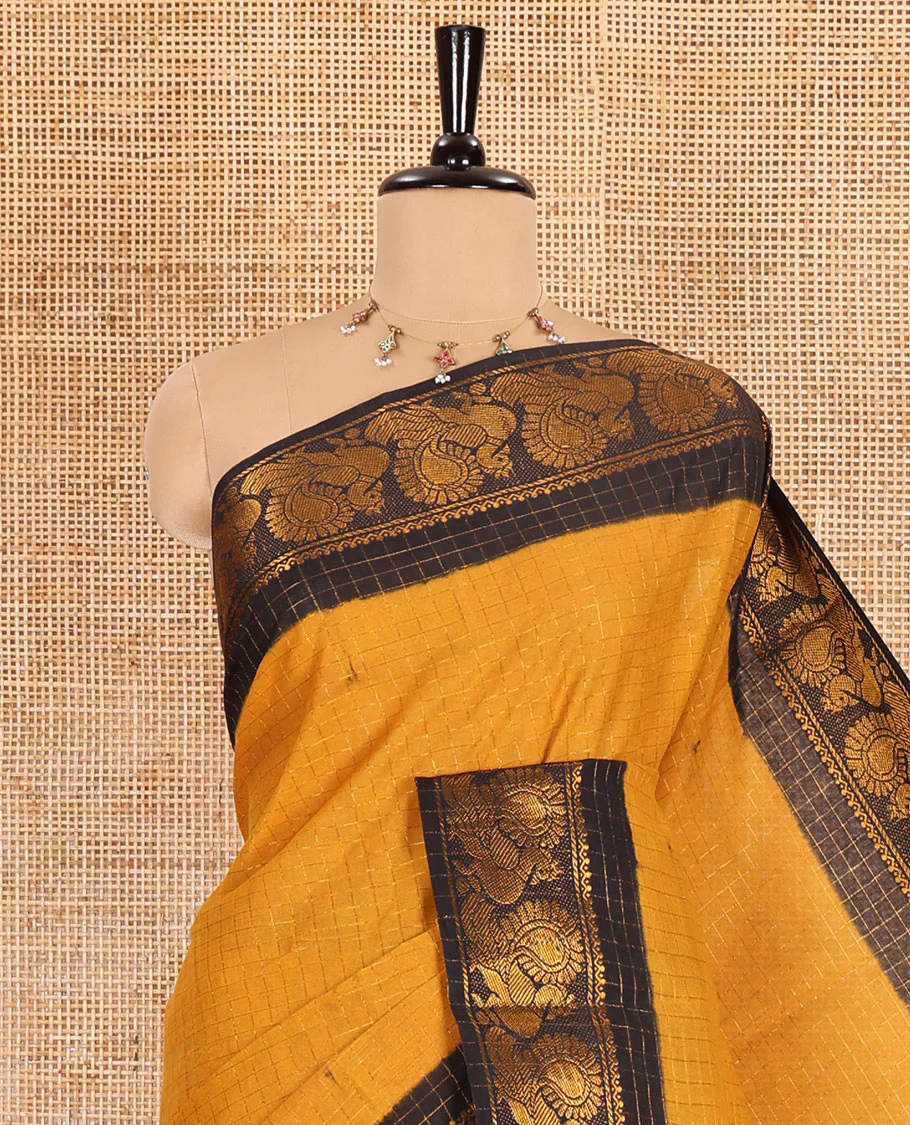 Mustard zari checked sungudi cotton saree, contrast zari border of peacock motifs, zari striped border, and a contrast blouse - Image 2