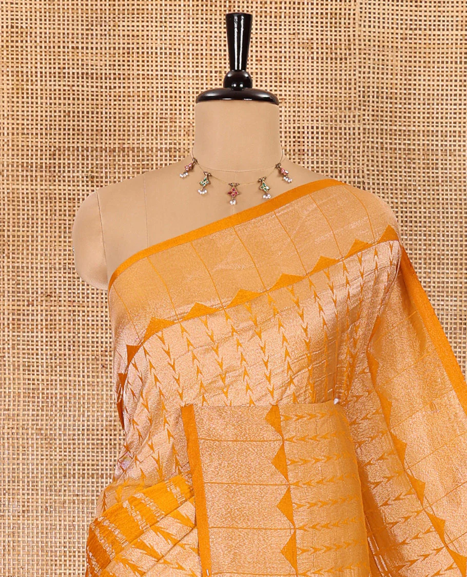 Mustard zari geometric fancy crepe saree, temple zari border, zari striped pallu, and a matching buttas woven blouse - Image 2