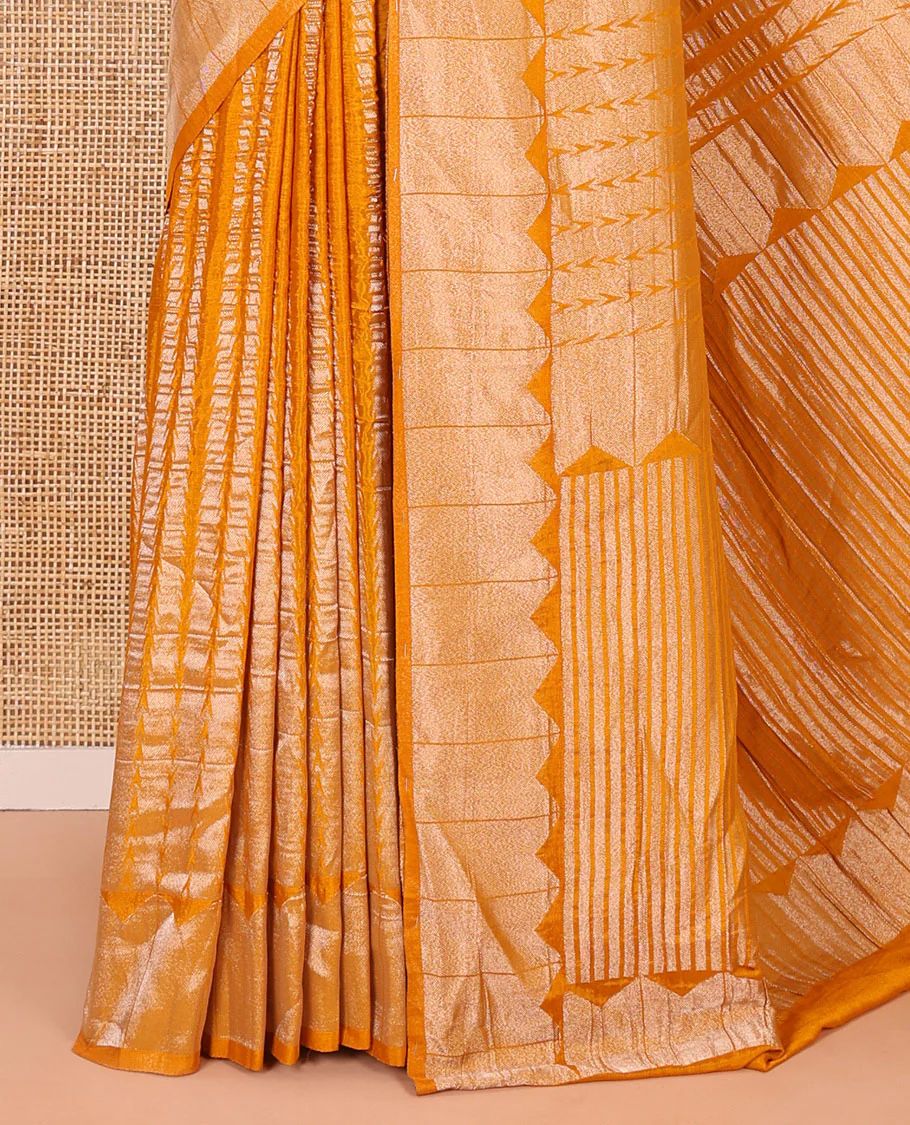 Mustard zari geometric fancy crepe saree, temple zari border, zari striped pallu, and a matching buttas woven blouse - Image 3
