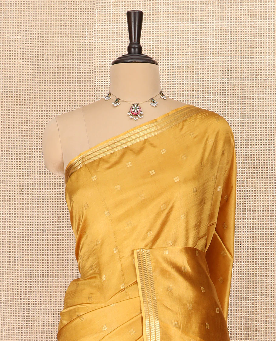 Mustrad Banana Pith Saree Subtly Sparkled with Zari Buttas Woven All Over Its Body, Subtle Piping Zari Border, Gleaming Zari Stripes Woven Pallu, and Paired with a Matching Plain Blouse - Image 2