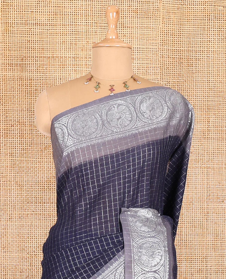 Navy blue and grey checked sungudi cotton saree, contrast silver zari round peacock border, striped pallu, and a contrast checked blouse - Image 3