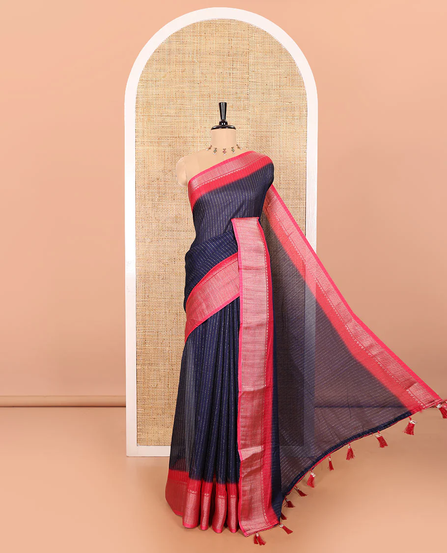 Navy Blue and Pink Dola Silk Saree Subtly Sparked with Vertical Golden Stripes Running All Over Its Body, Complemented by a Contrast Traditional Zari Design Woven Border, Subtly Striped Pallu, and a Contrast Buttas Woven Blouse