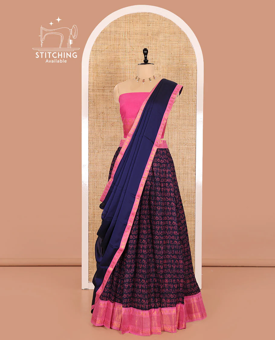 Navy Blue and Pink Printed Sungudi Cotton Half-Saree Showcasing a Skirt Printed with Tamil Letters, Accentuated by a Contrast Traditional Zari Border, a Contrast Blouse, and a Plain Zari-Bordered Dhavani - Image 3