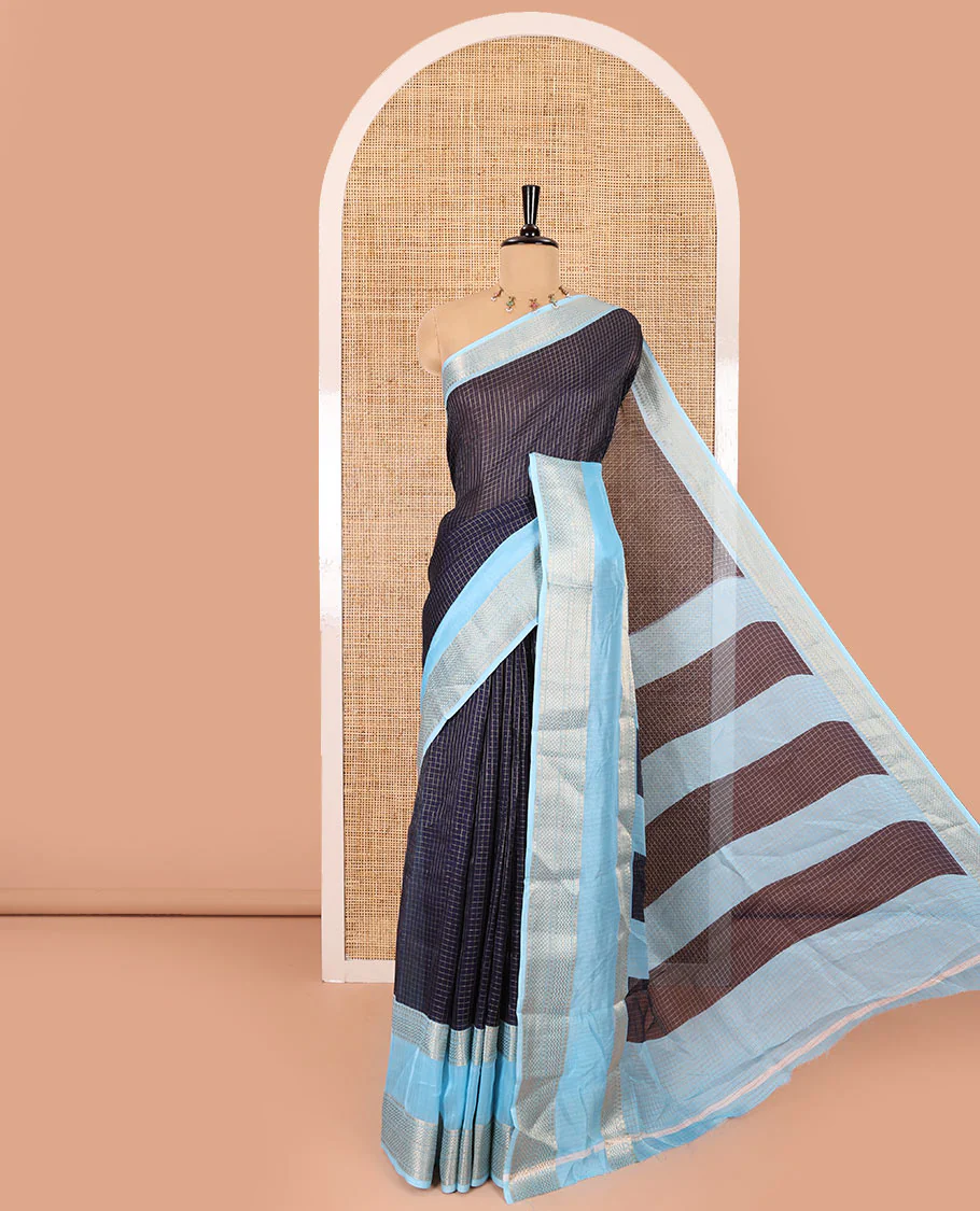 Navy blue checked moss chiffon saree, contrast traditional zari rettai pettu border, striped pallu, and a contrast zari design blouse
