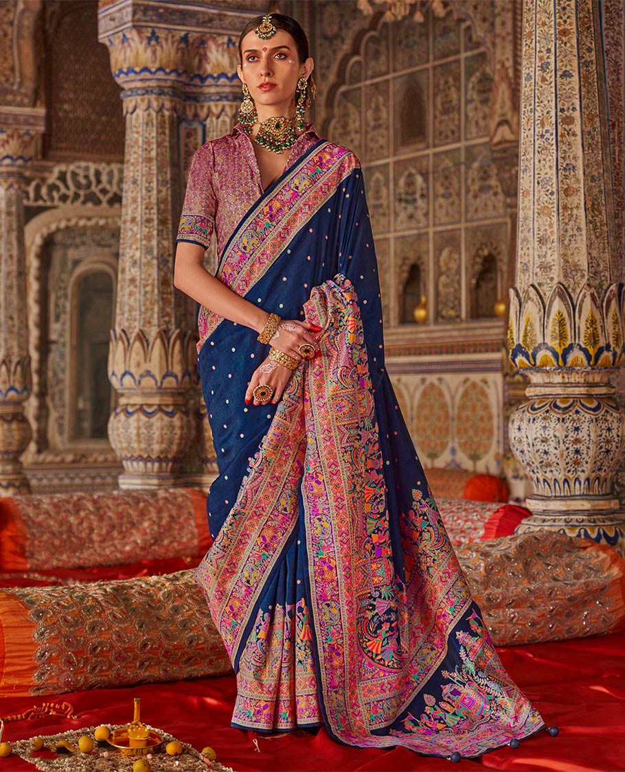 Navy blue meena buttas designer catalog saree, contrast meenakari border of human and elephant motifs, and wedding theme meenakari pallu
