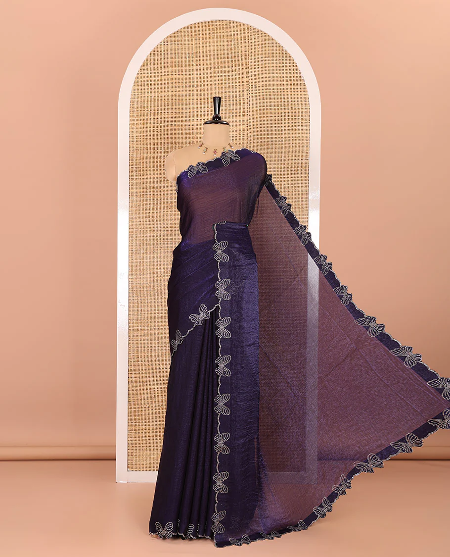 Navy blue plain fendy chiffon saree, scallop border of butterfly motifs in stone work, self-pallu, and a matching blouse