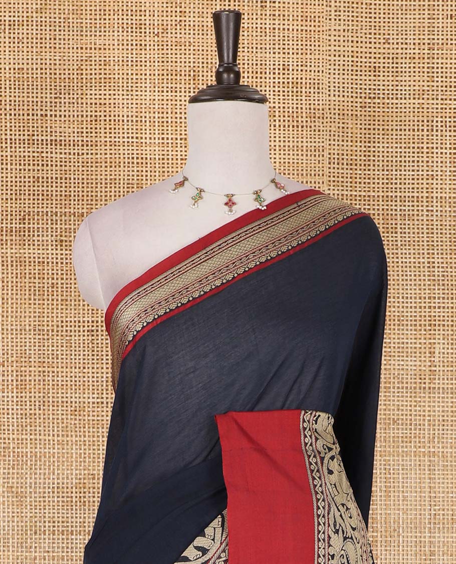 Navy blue plain mercerised cotton saree, contrast traditional border of peacock, and elephant motifs, striped pallu, and a matching blouse - Image 3