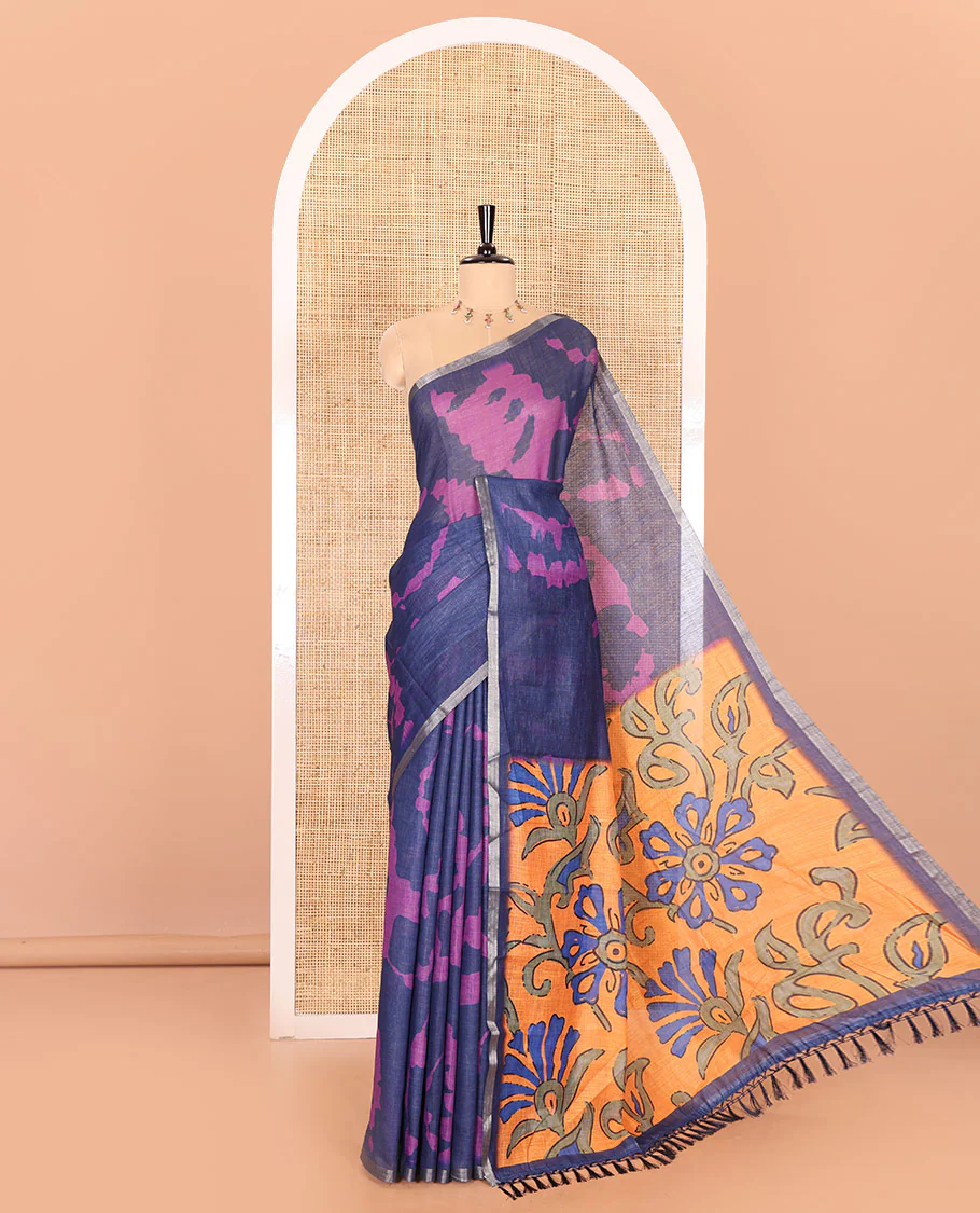 Navy blue shibori printed linen cotton saree, piping border, contrast floral printed pallu, and a contrast floral printed blouse