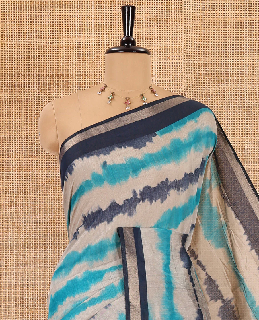 Navy blue shibori printed muslin cotton saree, contrast zari border, village theme printed pallu, and a contrast dots printed blouse - Image 2