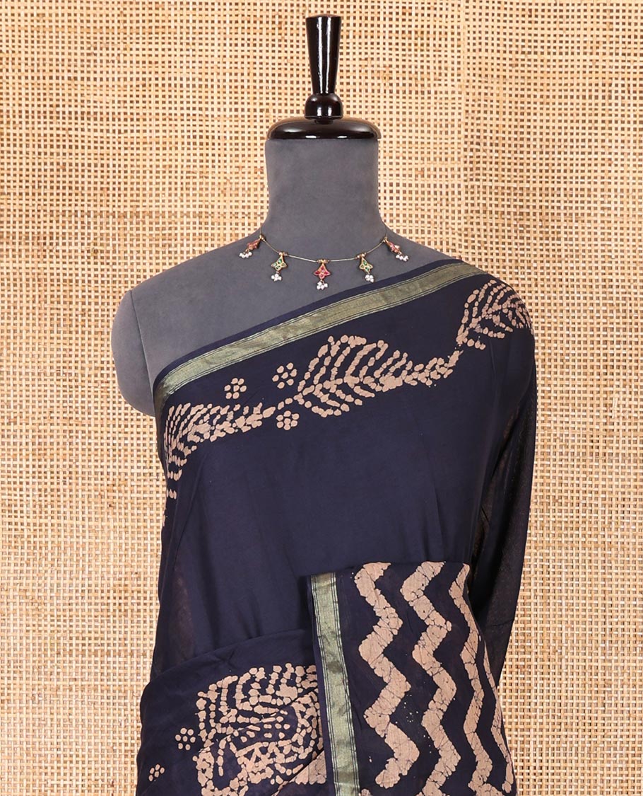 Navy blue wax batik-style zig-zag printed pure cotton saree, gold zari piping border, human figurines batik printed pallu, and a matching blouse - Image 3