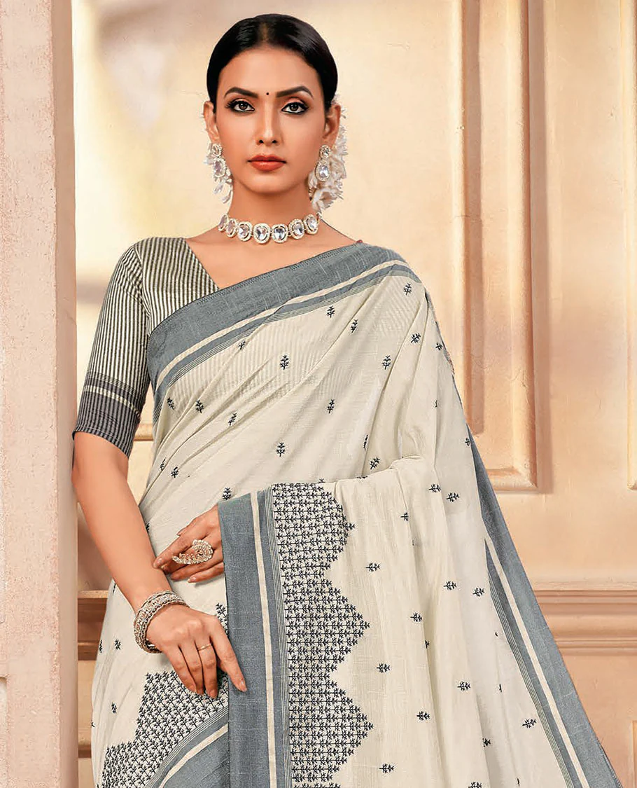 Off-white floral motifs embroidered designer saree, contrast embroidered border, and striped pallu - Image 2