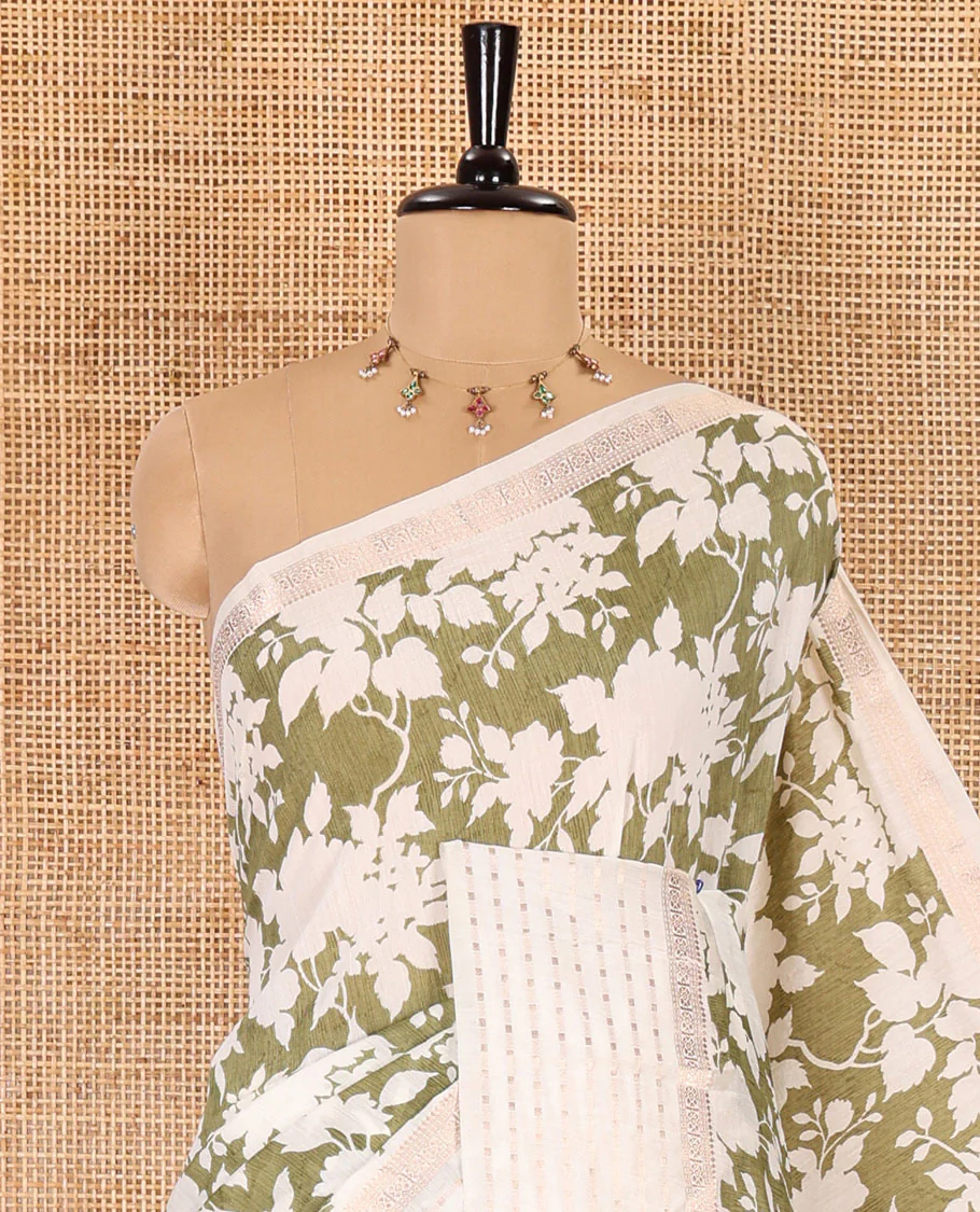 Olive green silhouette-style floral discharge printed Assam silk saree, contrast traditional zari border of rudraksham motifs, zari striped pallu, and a floral printed blouse - Image 2