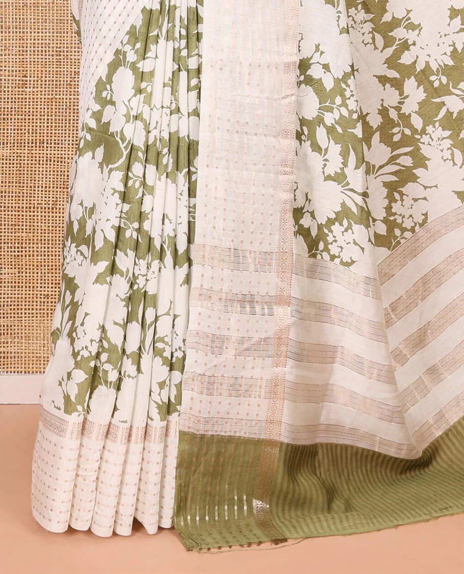 Olive green silhouette-style floral discharge printed Assam silk saree, contrast traditional zari border of rudraksham motifs, zari striped pallu, and a floral printed blouse - Image 3