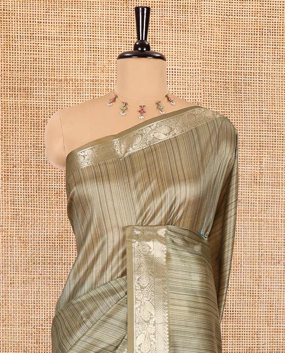 Olive green striped semi-tussar saree, traditional zari border of floral creeper designs, contrast pallu of Pichwai cow print, and contrast Pichwai cow printed blouse - Image 3
