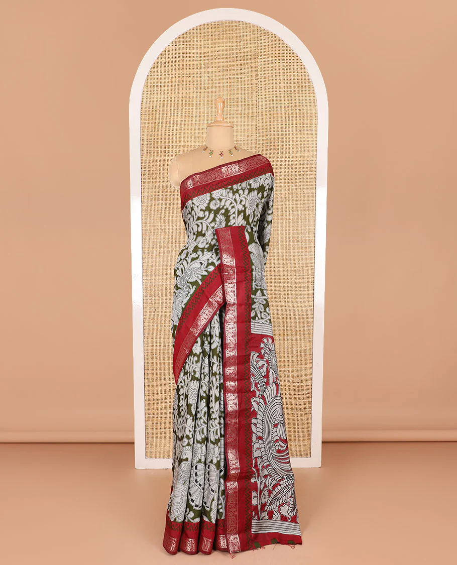 Olive kalamkari floral vine and peacock printed muslin cotton saree, contrast zari border, kalamkari peacock printed pallu, and a contrast coin buttas printed blouse - Image 2