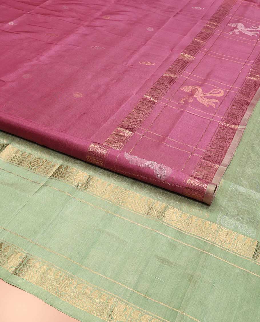 Onion Pink Uppada Silk Saree Elevated with Floral Buttas, Captivating Contrast Border of Traditional Zari Motifs and Peacock Motifs, Pallu Depicting Floral Jaal Design, and Paired with a Contrast Zari-Bordered Blouse - Image 2