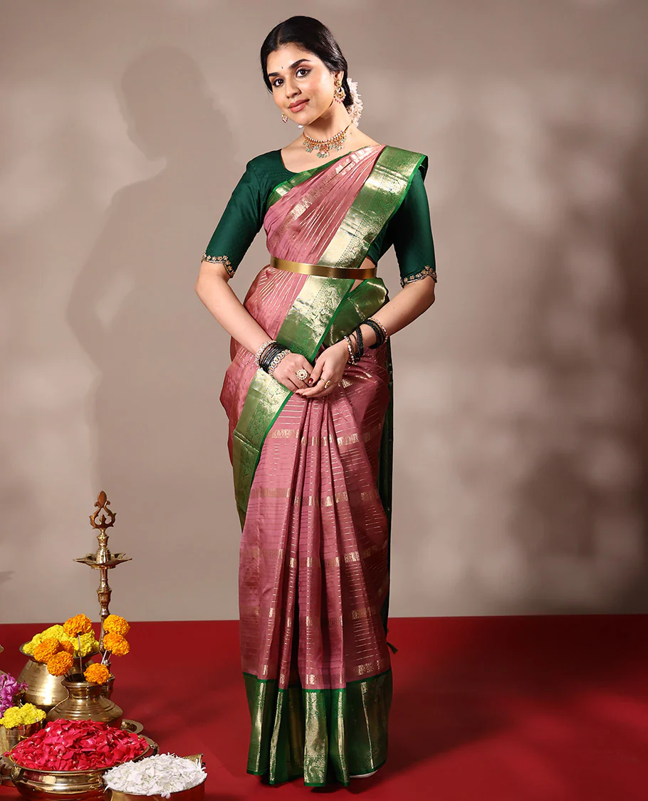 Onion pink veldari stripes, diamond, kamalam design Vasundhara silk saree, contrast border of rekku, mayil kann, and kili motifs, and intricate pallu