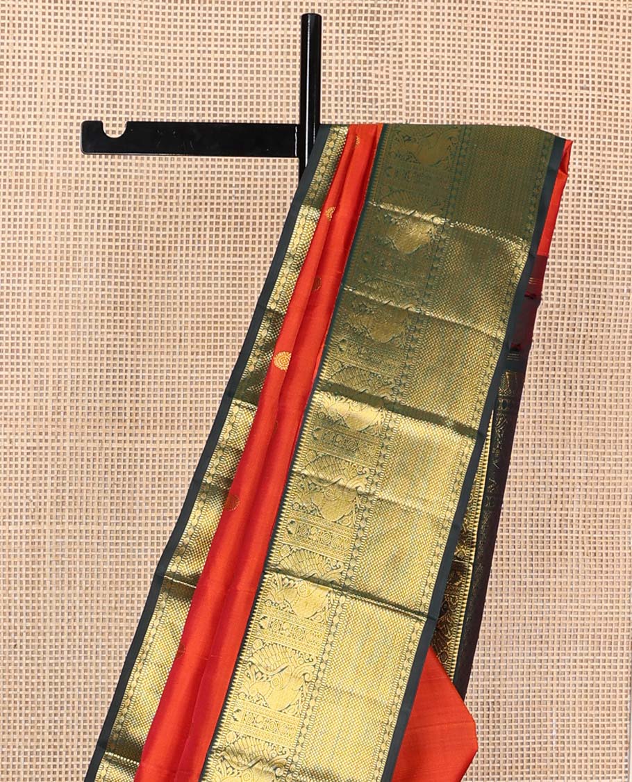 Orange chakram buttas Kanchipuram korvai silk saree, contrast neer korvai border of rekku, muthu, mayil, chakram, poun, and kuyil kann designs, and jaal pallu - Image 4