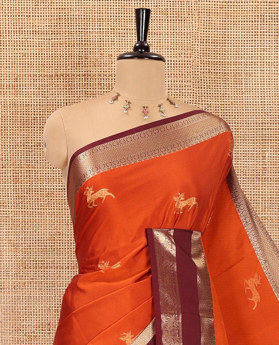 Orange deer motifs zari woven kanchi soft silk saree, contrast traditional zari design rettai pettu border, pallu of Mughal-style floral designs, and contrast plain blouse - Image 2