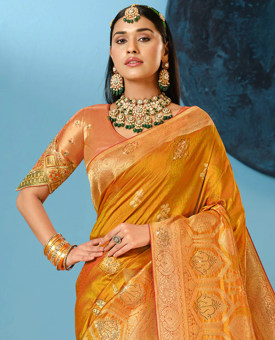 Orange Designer Saree Decked Up with Buttas and Micro-Stone Work, Featuring a Zari-Stonework Border, Intricately Embroidered Pallu, and a Contrast Embroidered Blouse - Image 2