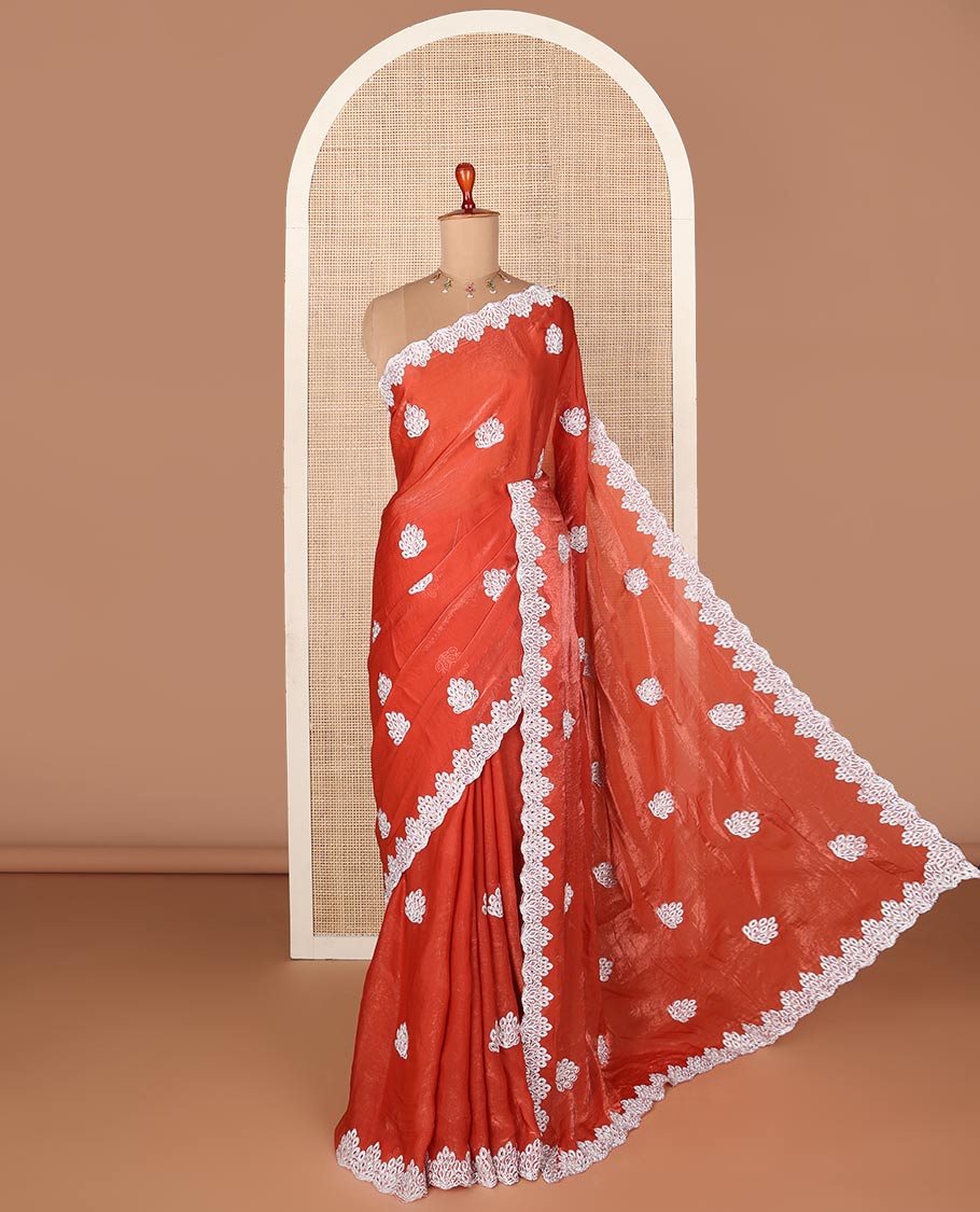 Orange designer saree with silver embroidery thread, intricate motifs & scallop embroidery boder